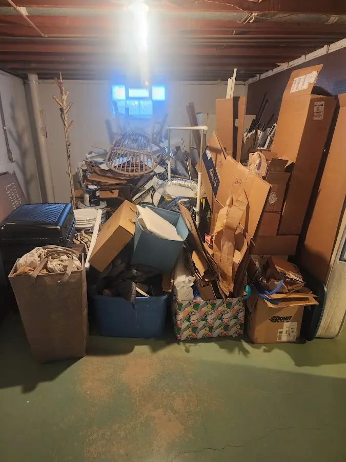 Roll-off dumpster container at job site for 6 Yard Dumpster Rental in Williamsburg